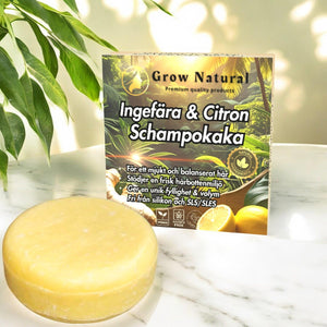 Grow Natural™ – Ingefära & Citron schampokaka med förpackning i naturmiljö